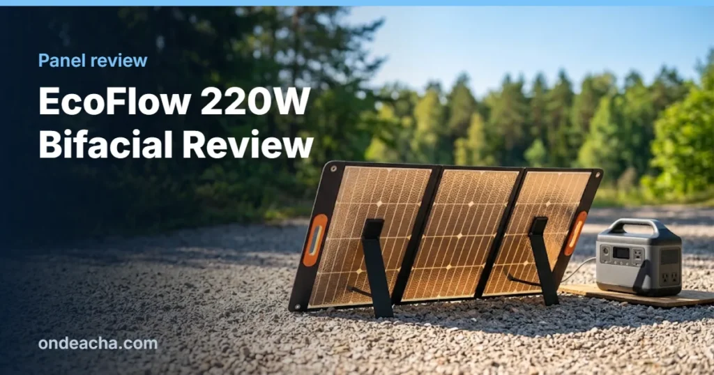 Large bifacial folding solar panel on light gravel next to a portable power station