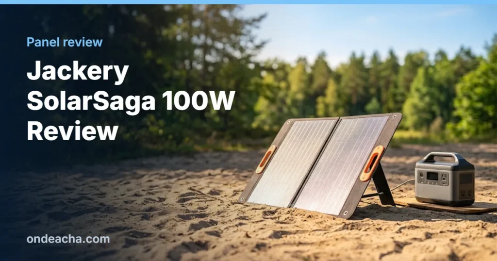 Slim folding 100W solar panel on a sandy campsite charging a small power station
